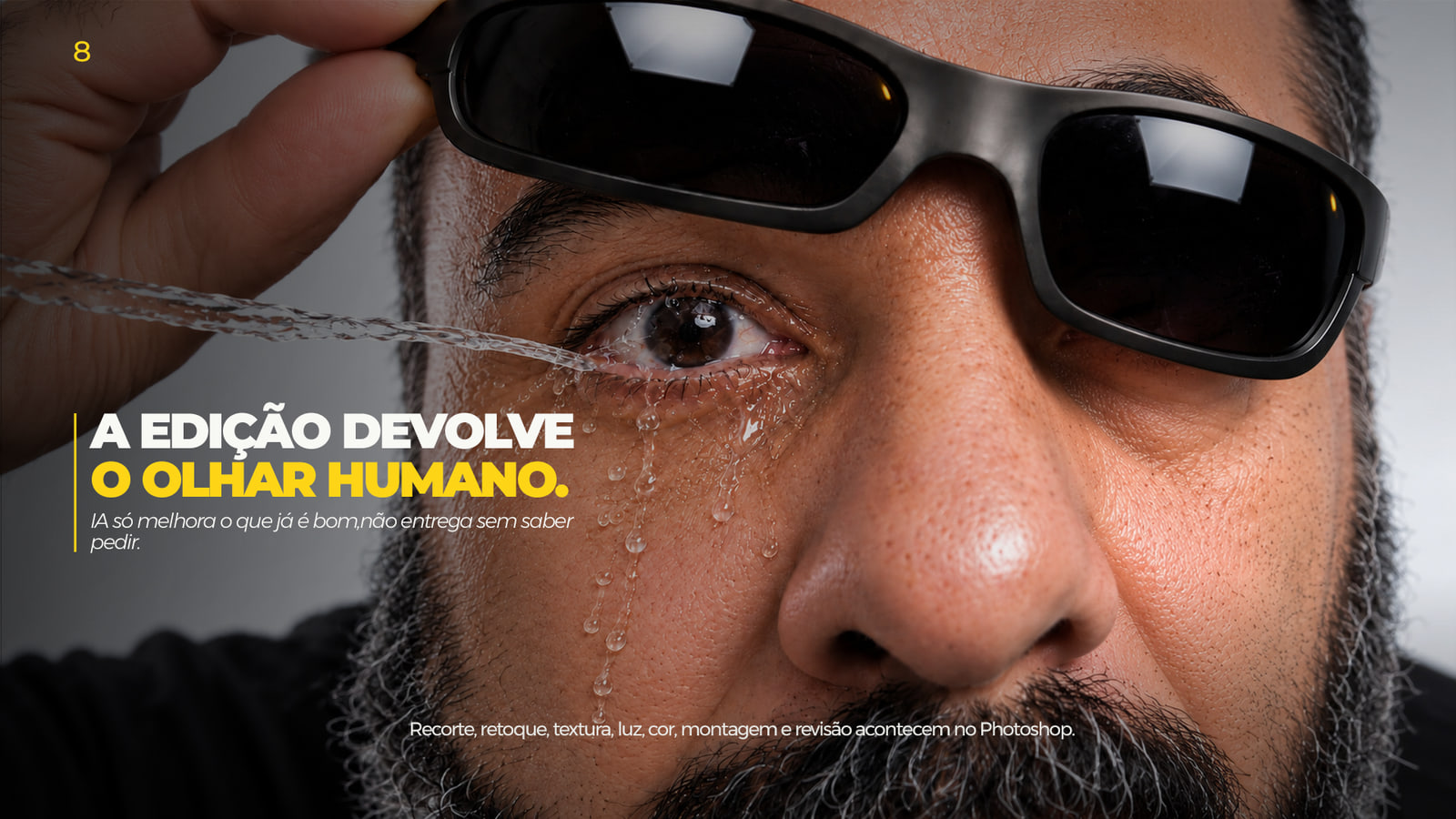 Close extremo de um olho com lágrima e óculos escuros levantados, com a frase “A edição devolve o olhar humano”.